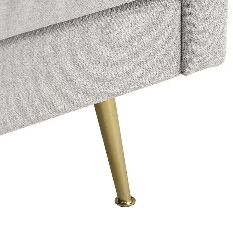 Canapé en tissu gris avec pieds en métal doré
