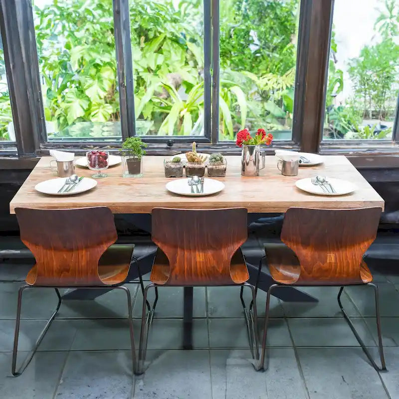 Table à manger en bois de manguier de 160 cm avec pieds araignée en métal