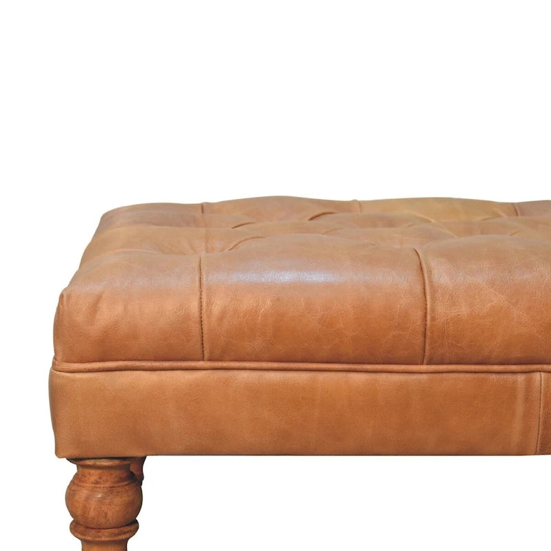 Pouf en cuir pleine fleur couleur havane, avec pieds à roulettes en bois massif